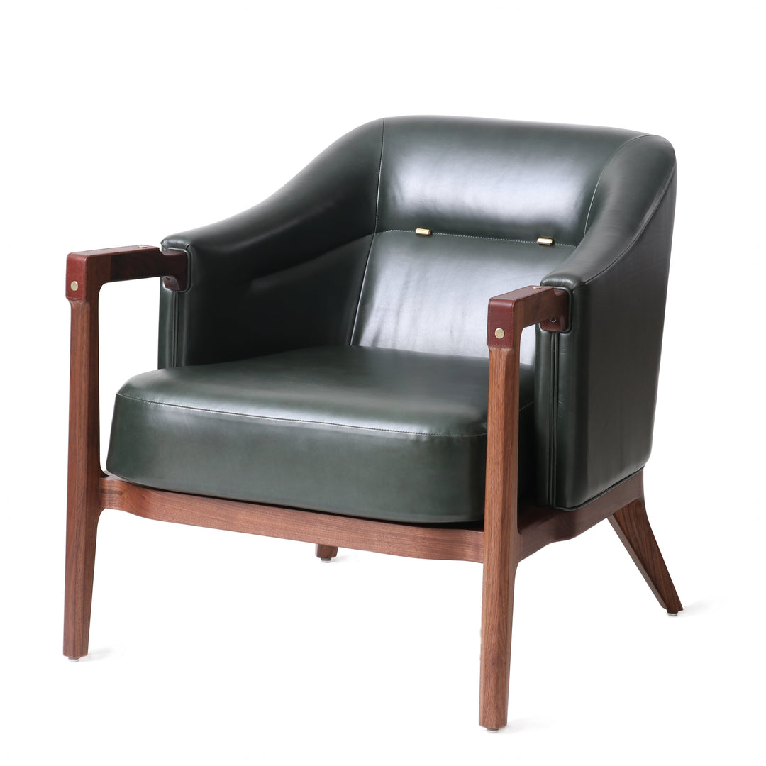 Modern lounge chair with natural walnut wooden frame, dark green leather upholstery, and brass details, perfect for contemporary living rooms or stylish office spaces.