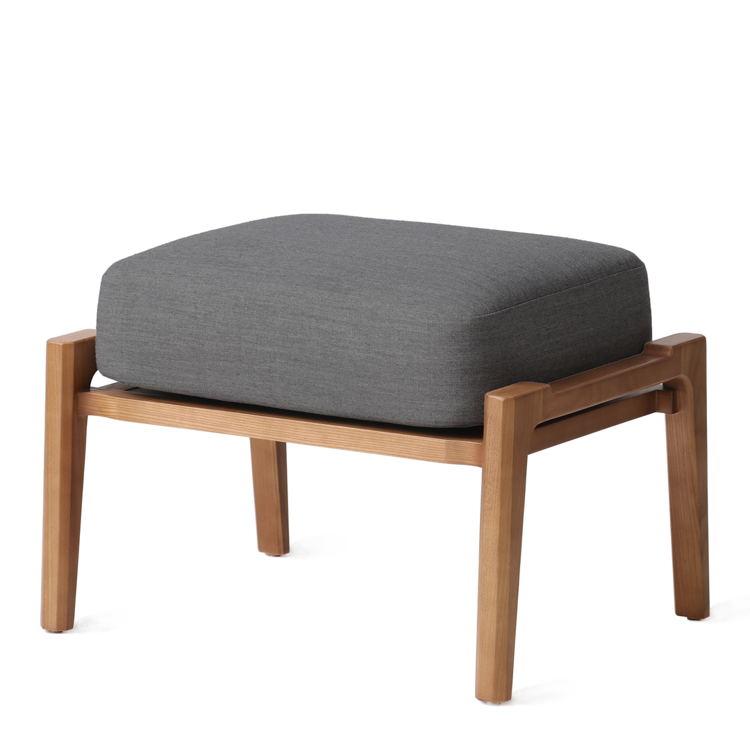 Modern ottoman with natural walnut wooden frame and grey fabric cushion, ideal for complementing lounge chairs in contemporary home or office decor.